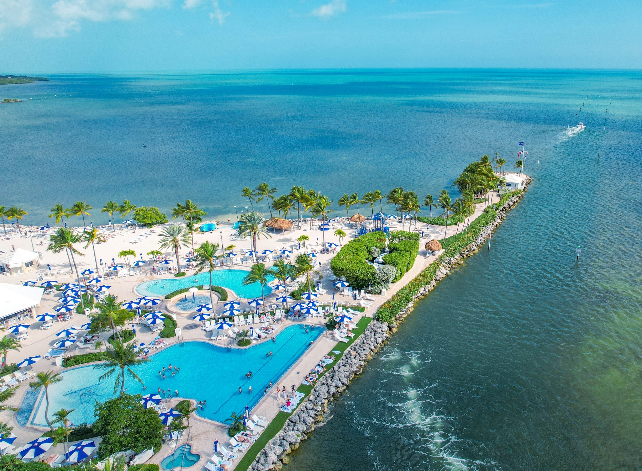 Resort pool and beach area at Ocean Reef Club