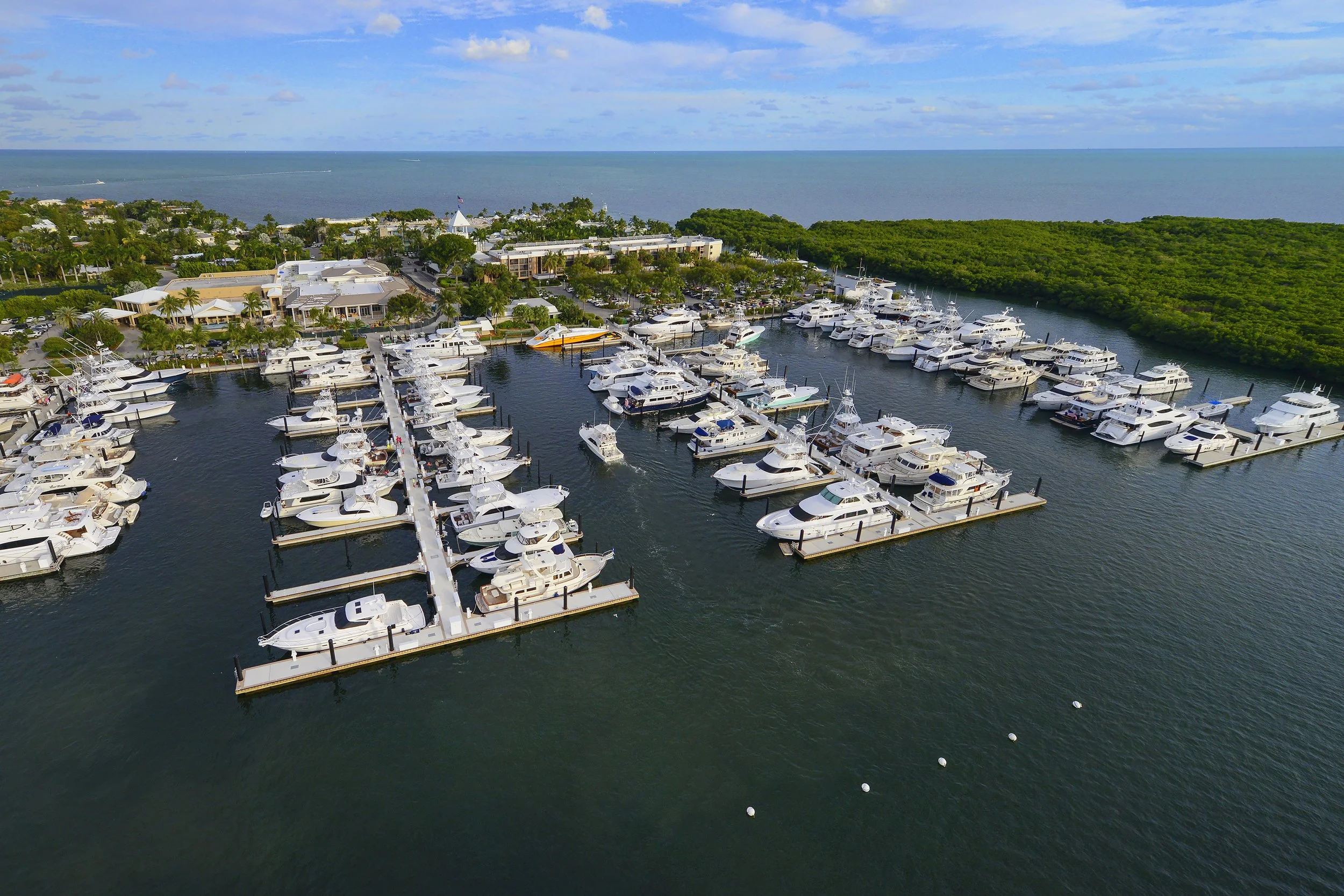 Mega yachts docked at Ocean Reef Club marina