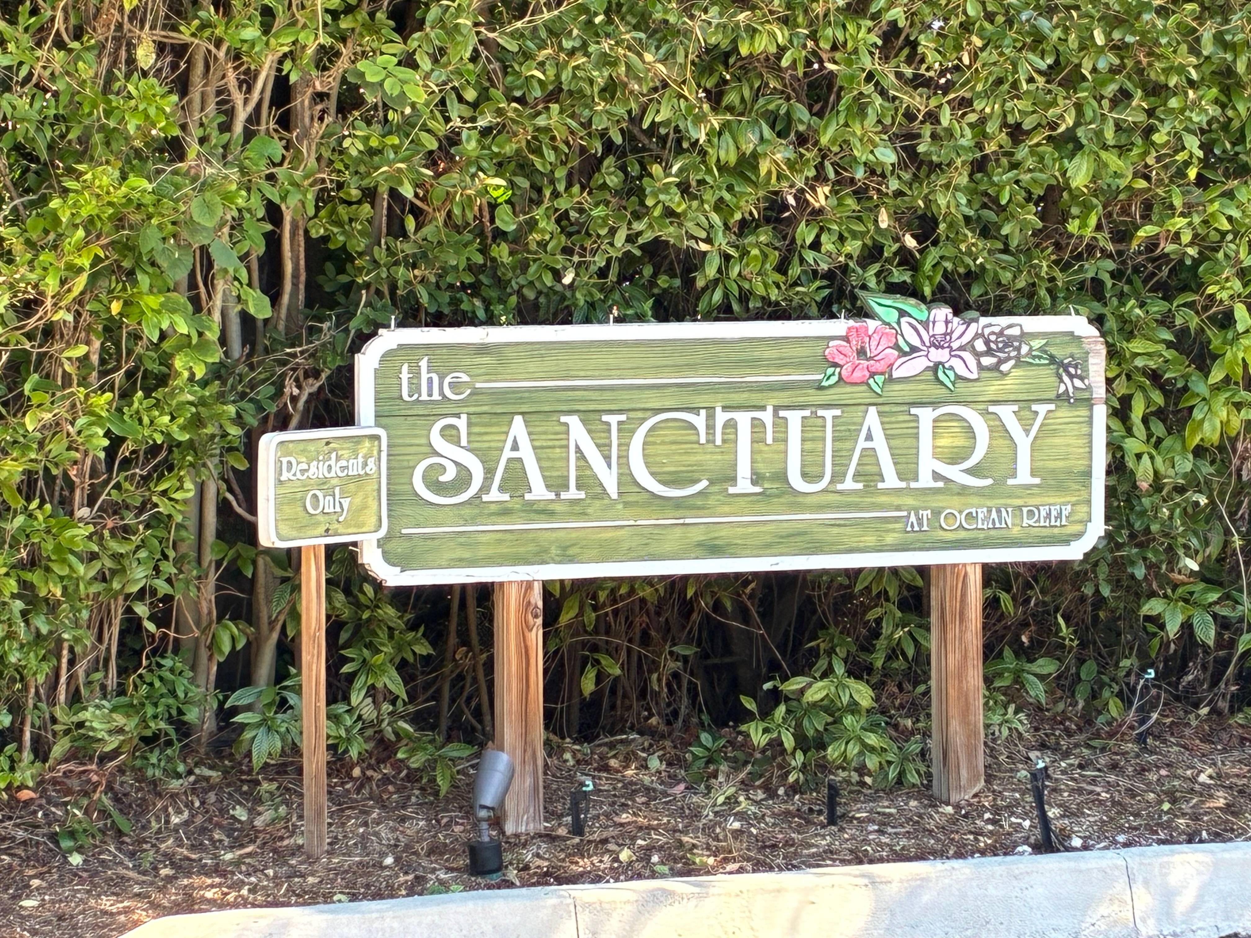 The Sanctuary neighborhood sign at Ocean Reef